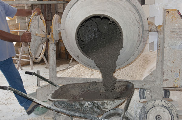 Pouring out the cement from mixer